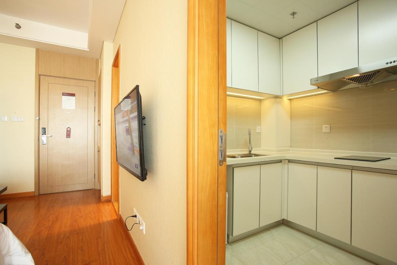 Yantai Tianma Apartment Bagian luar foto