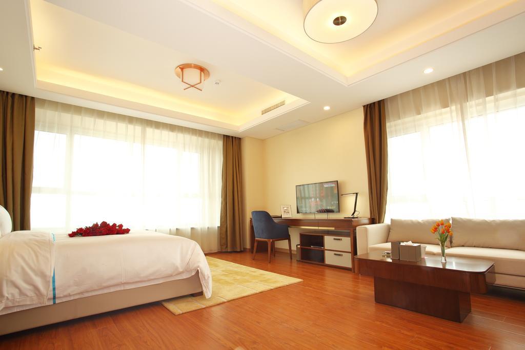 Yantai Tianma Apartment Bagian luar foto