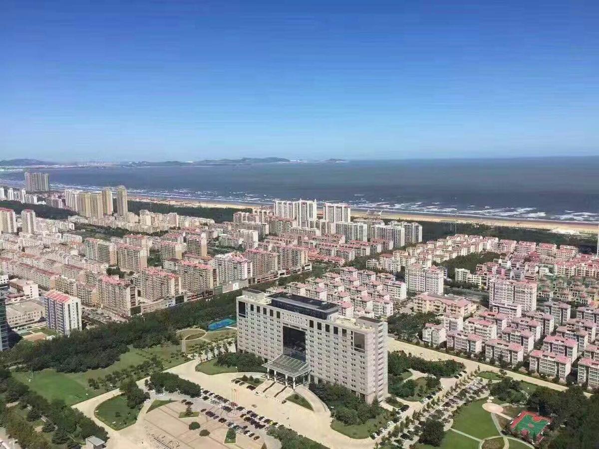 Yantai Tianma Apartment Bagian luar foto